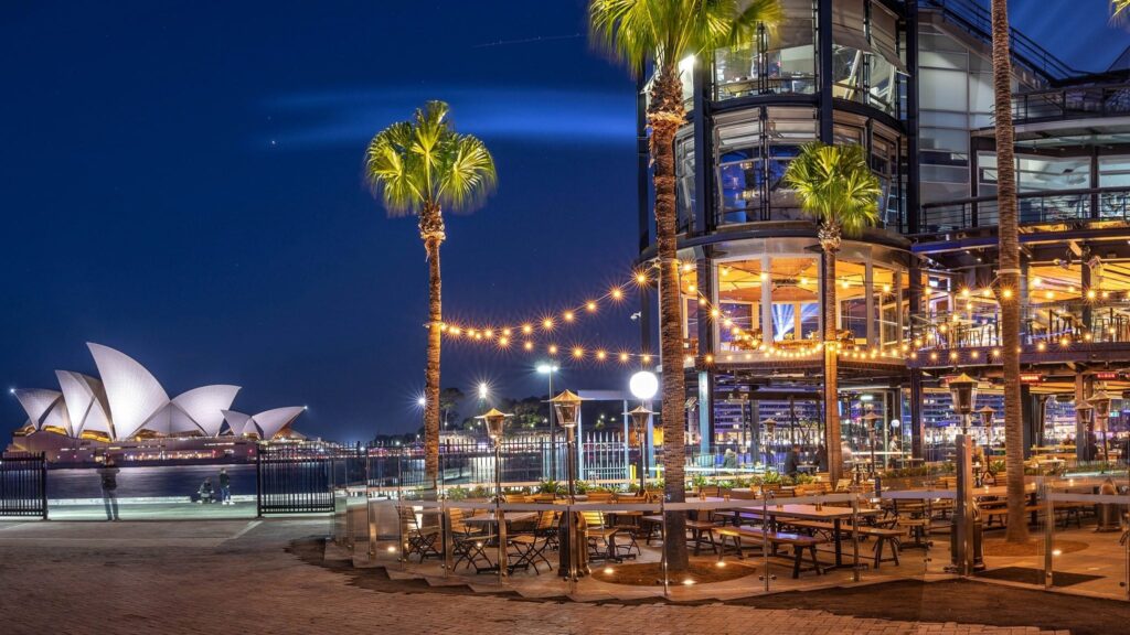 Squires Landing at night showing the Sydney Opera House in the background.